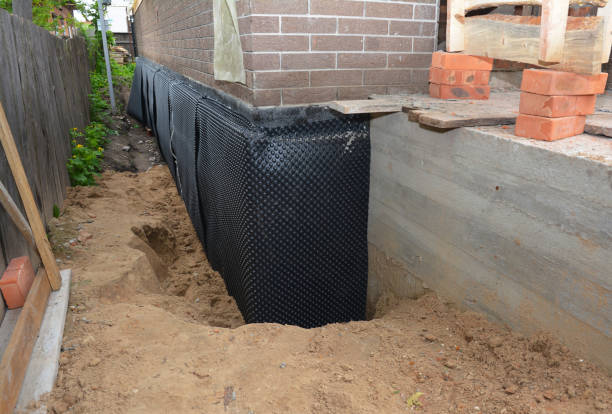 SJ Waterproofing Pros technician performing targeted Foundation Crack Repair assessment in Johnson City, NY